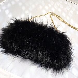 Black Trendy Fluffy Faux Fur purse with chain strap.
